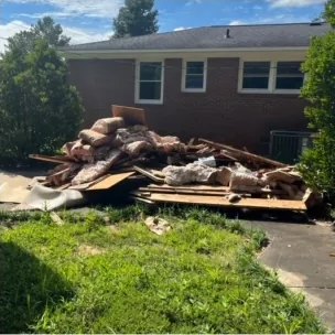 Before: a pile of construction debris in the front yard